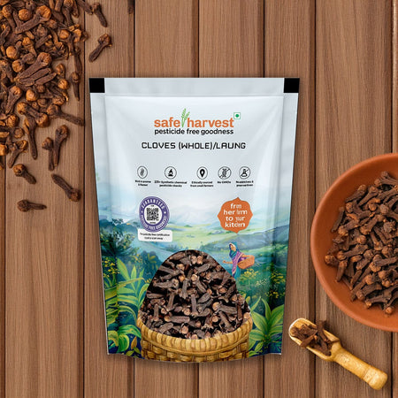 Safe Harvest pesticide-free whole cloves laung in a brown bowl on a wooden surface, NABL lab tested.
